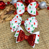 Festive multicolour Christmas light print bows, perfect for the holidays!