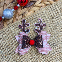 Adorable spotted fawn faux leather and sparkly glitter reindeer bows, perfect for Christmas!