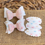 Adorable snap clips in sweet neutral prints!
