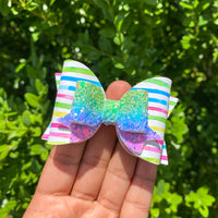 Multicoloured crayon stripe and glitter bows!