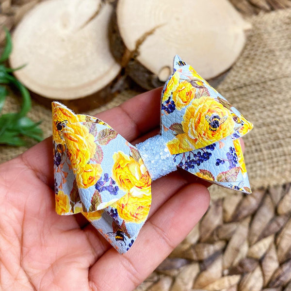 Beautiful blue and yellow floral bows!