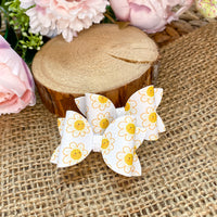 Adorable happy Daisy pigtail bows!