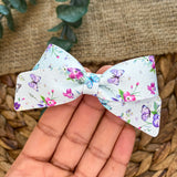 Pretty pansy and butterfly bows!