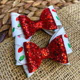 Festive multicolour Christmas light print bows, perfect for the holidays!