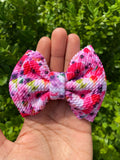 Bright floral bullet fabric bow clips or headbands.
